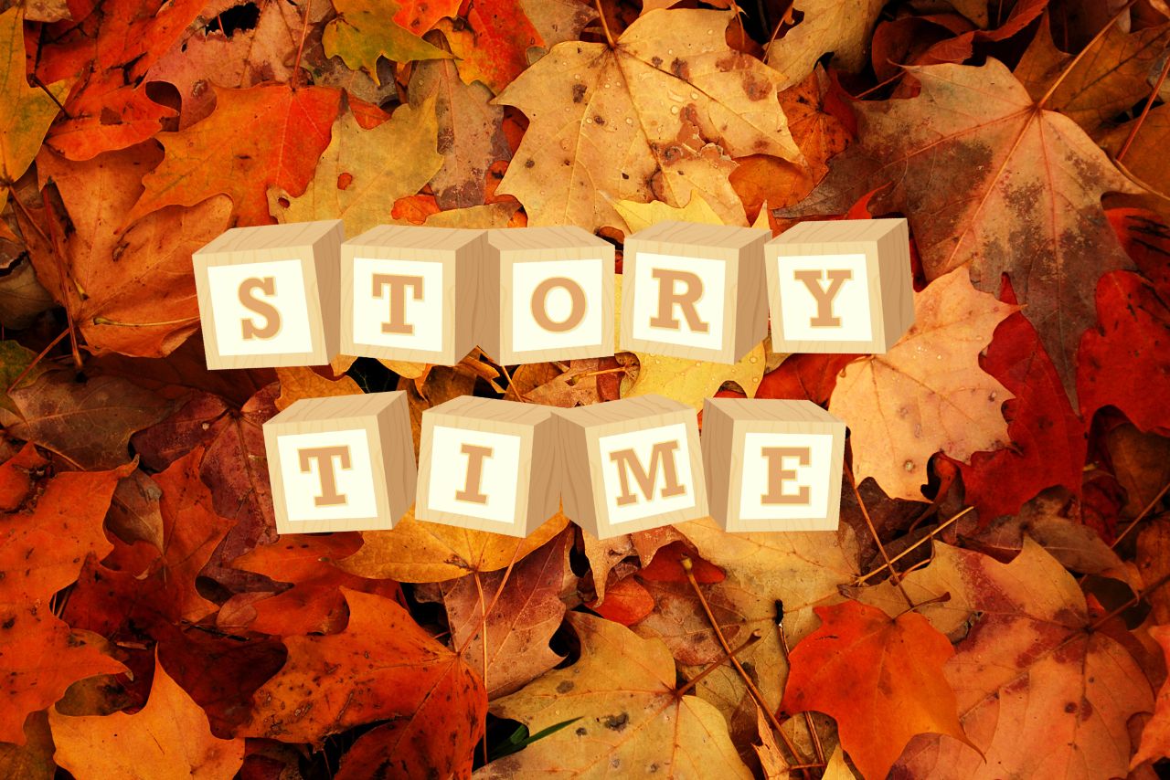 autumn leaves in background, story time spelled on wooden blocks